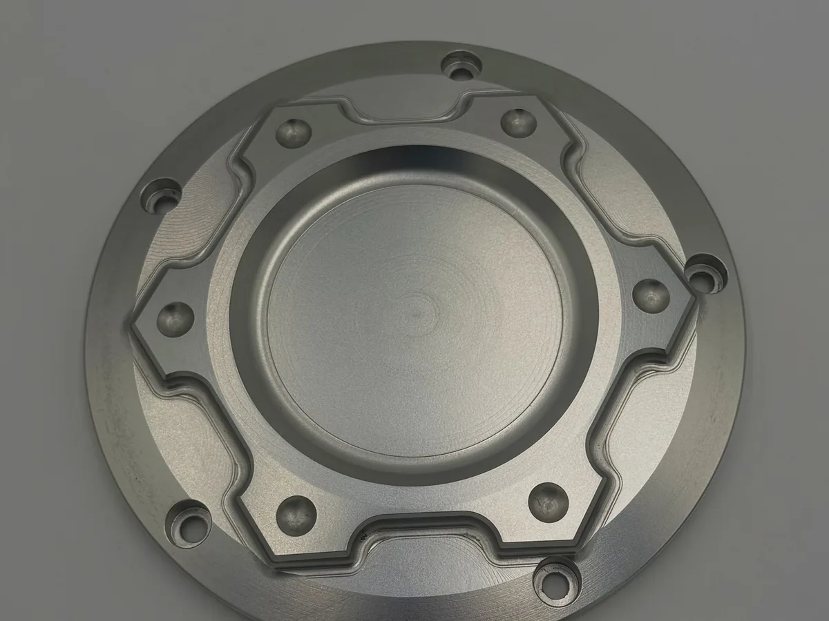 Clean bare-metal precision component before coating