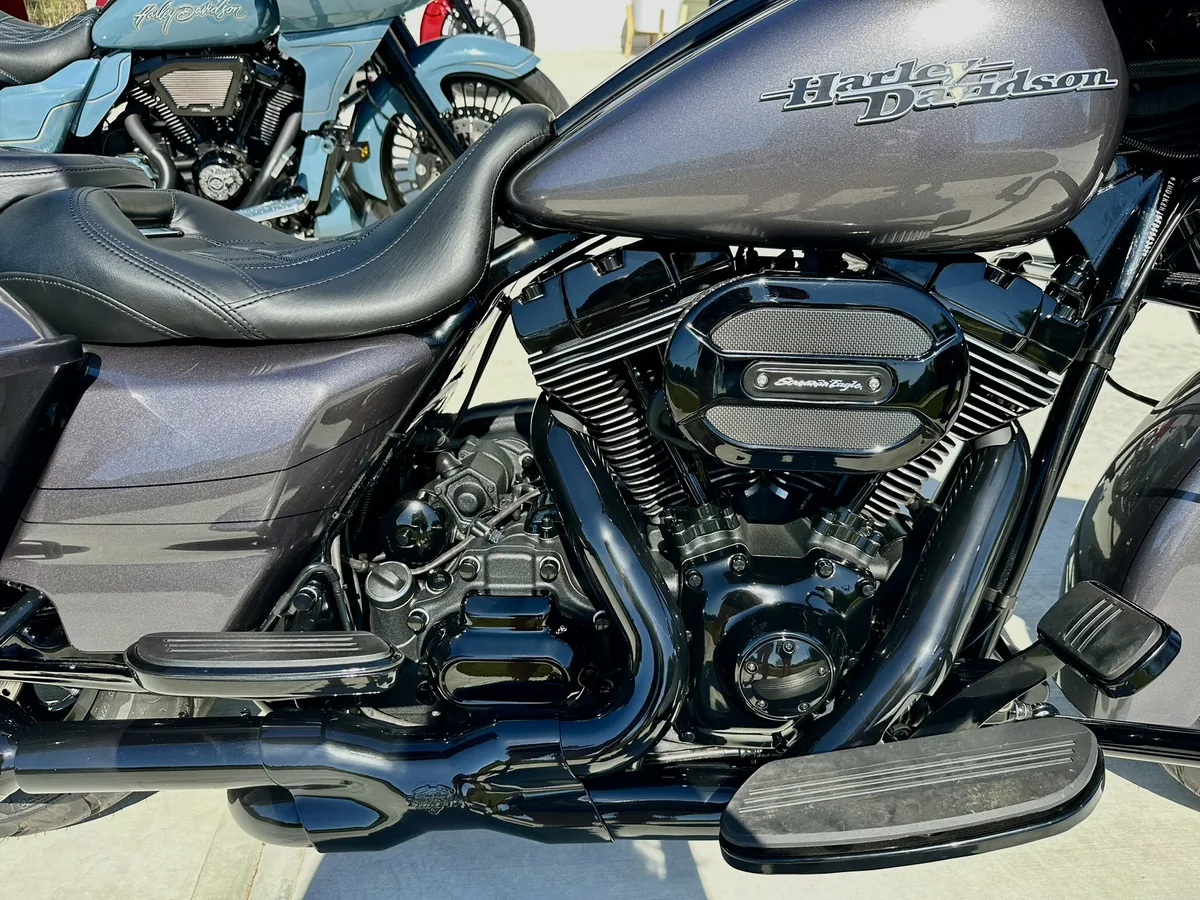 Finished motorcycle engine side with dark low-sheen components