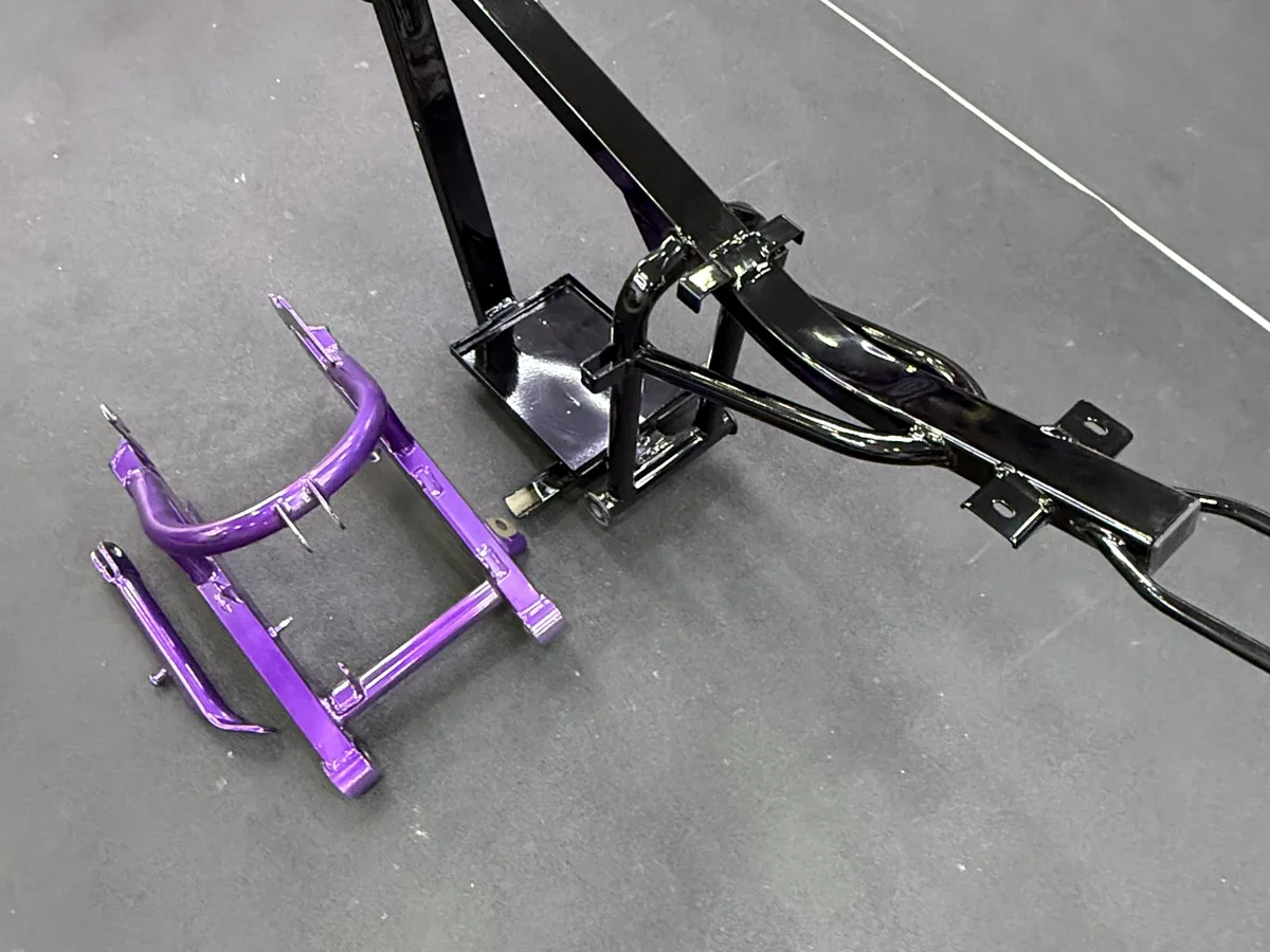 Gloss-black frame with purple coated swingarm